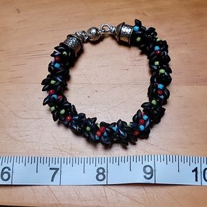 multi color/black Seed bracelet handmade with silver magnetic clasp